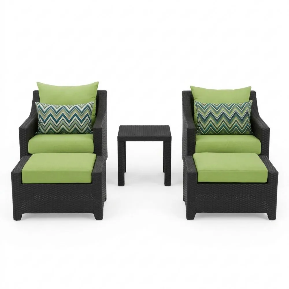 Gartenmöbel-Set aus Polyrattan mit grünen Kissen