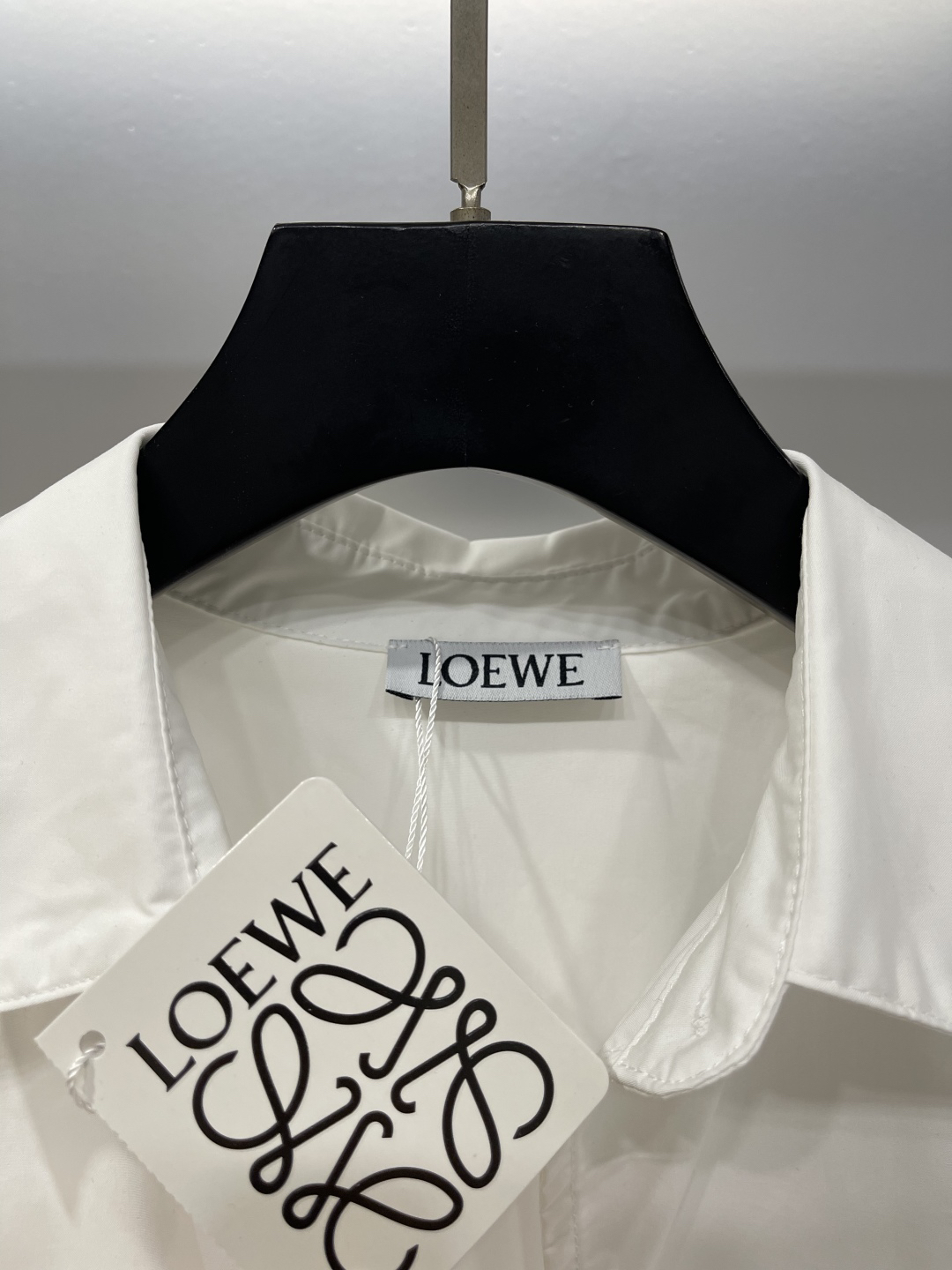 LOE monogrammed embroidered leather label long sleeve shirt