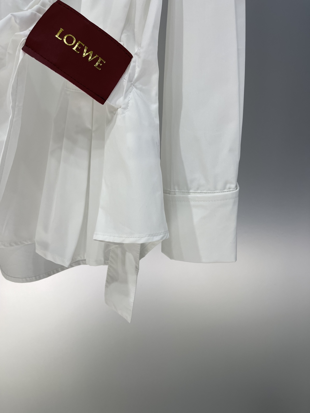 LOE monogrammed embroidered leather label long sleeve shirt