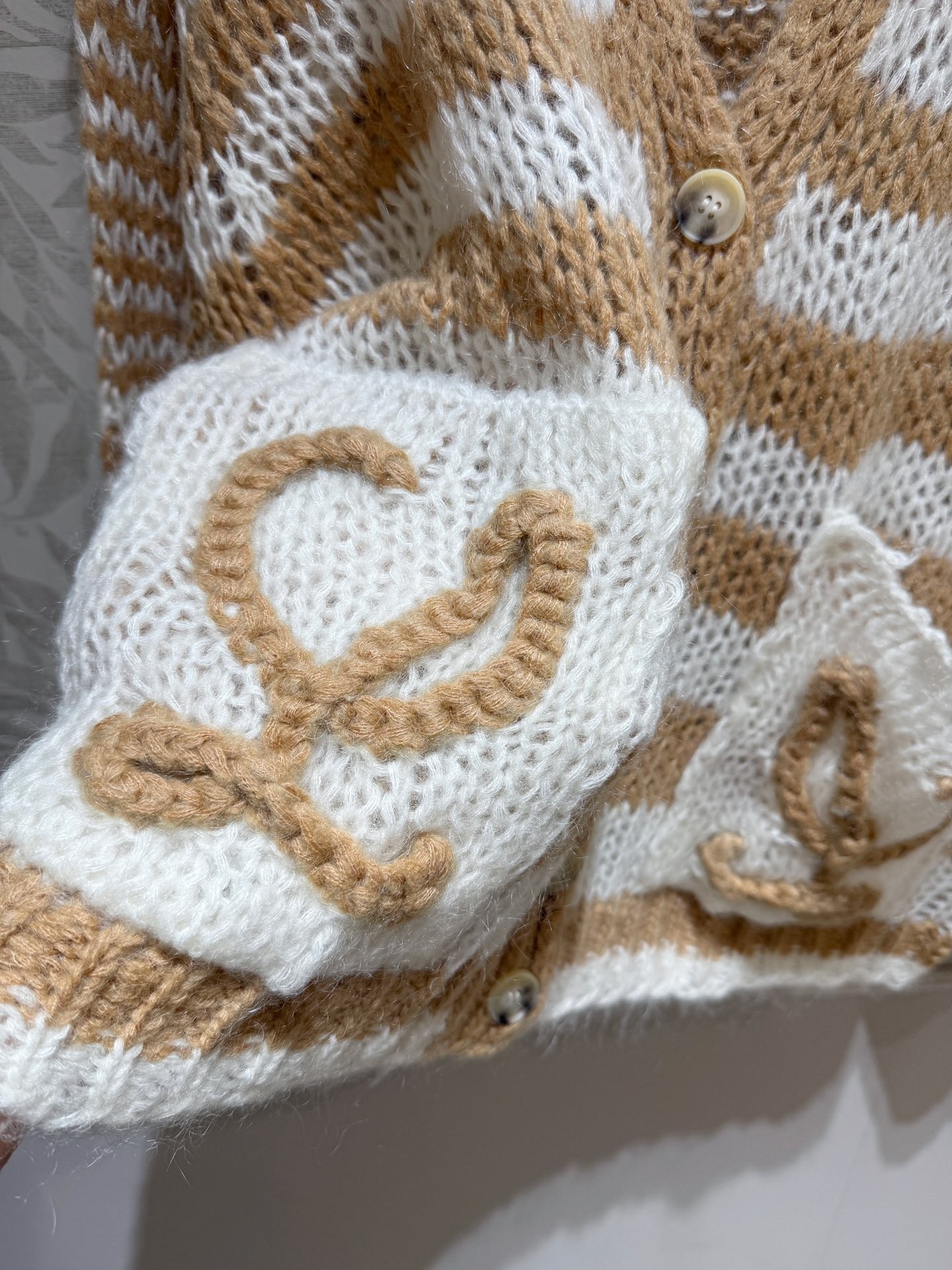 Striped hollow-out knitted cardigan