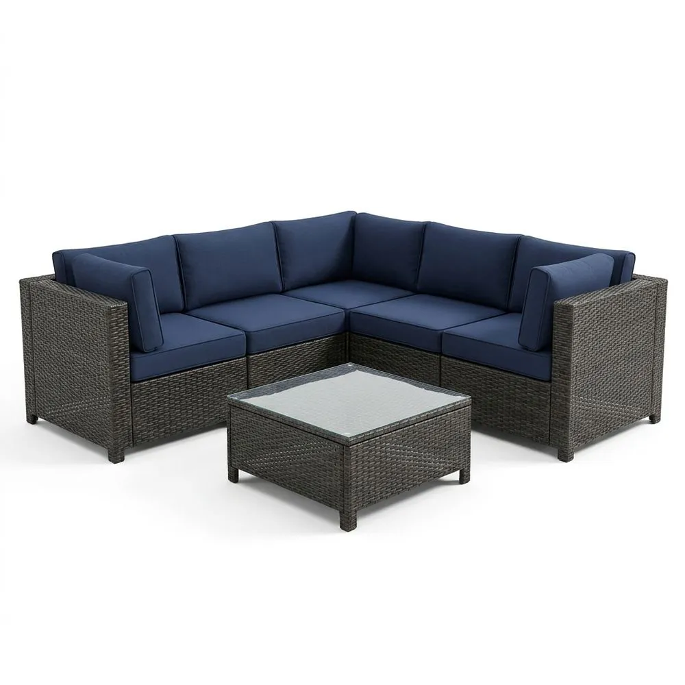 Set Divano Angolare in Rattan con Cuscini Blu e Tavolino in Vetro