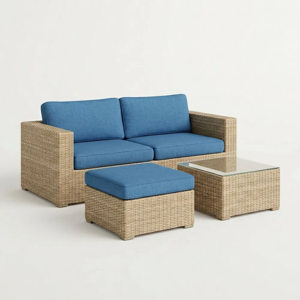 Set Divano Rattan con Cuscini Blu e Tavolino Vetro