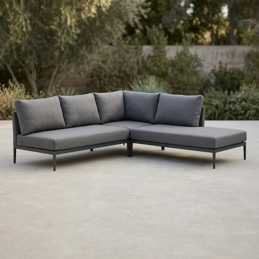 Sofá seccional en L de acero con tela para exteriores
