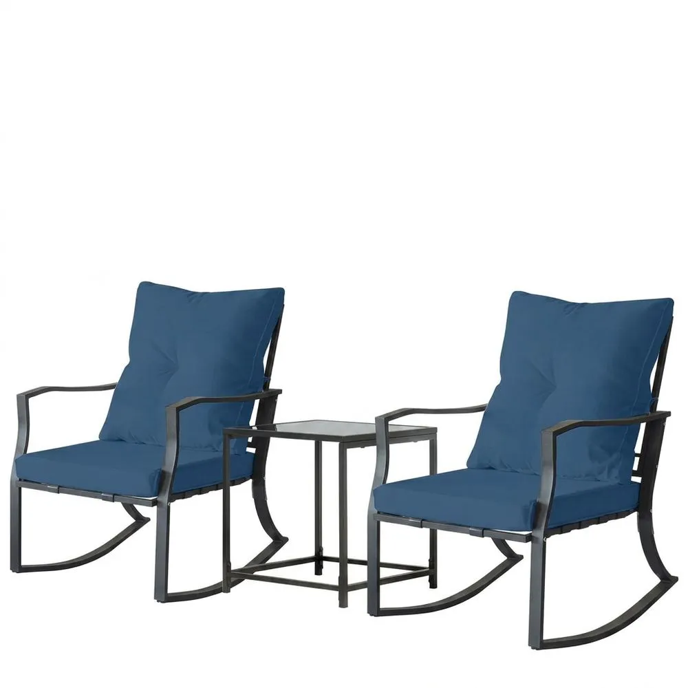Set composto da sedia a dondolo in alluminio con cuscini blu e tavolino in vetro
