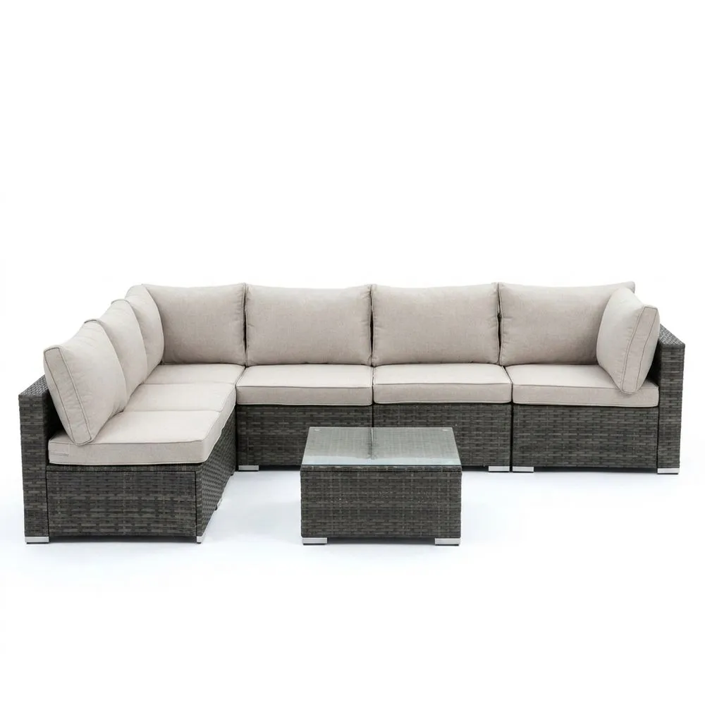 Divano angolare da giardino in rattan sintetico grigio con cuscini beige
