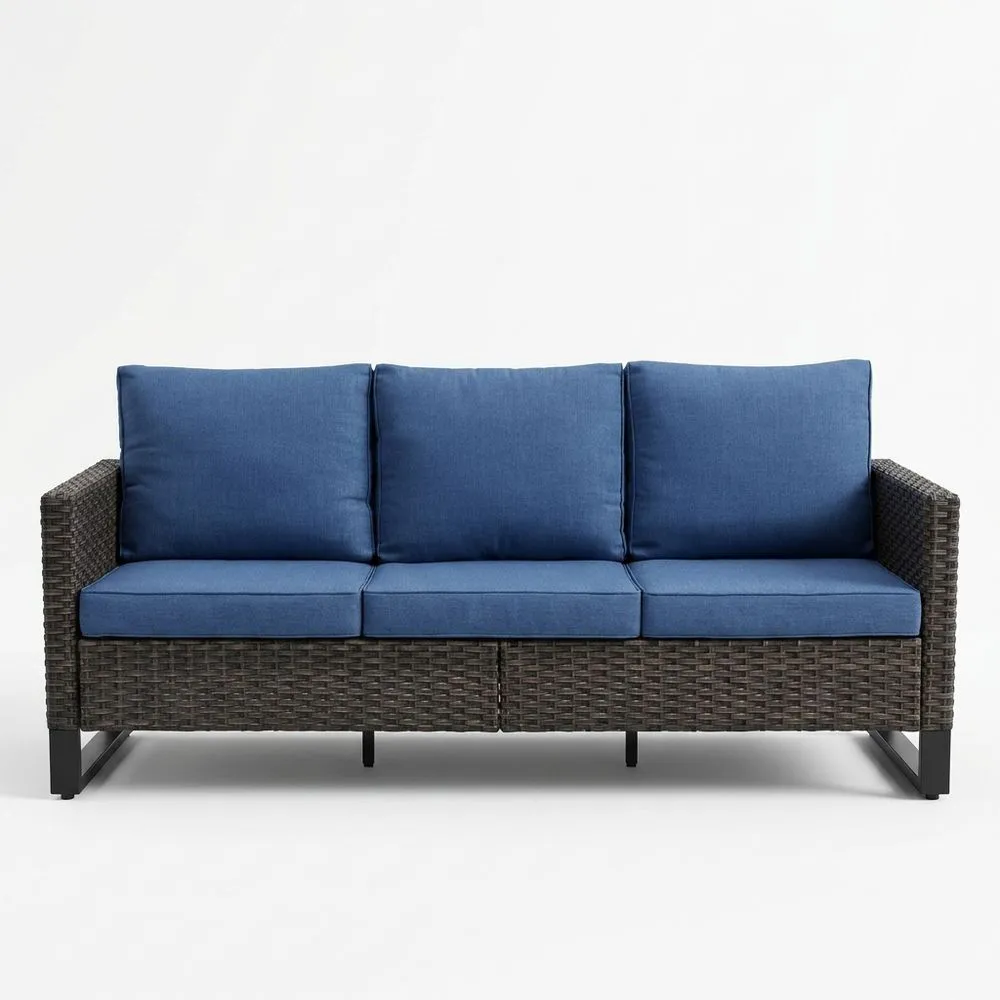 Divano a 3 posti in rattan con cuscini blu