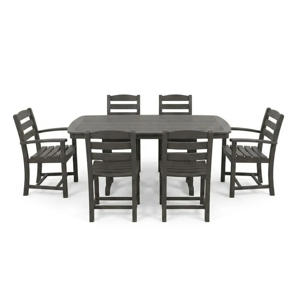 Il set da pranzo in legno di acacia comprende 1 tavolo e 6 sedie