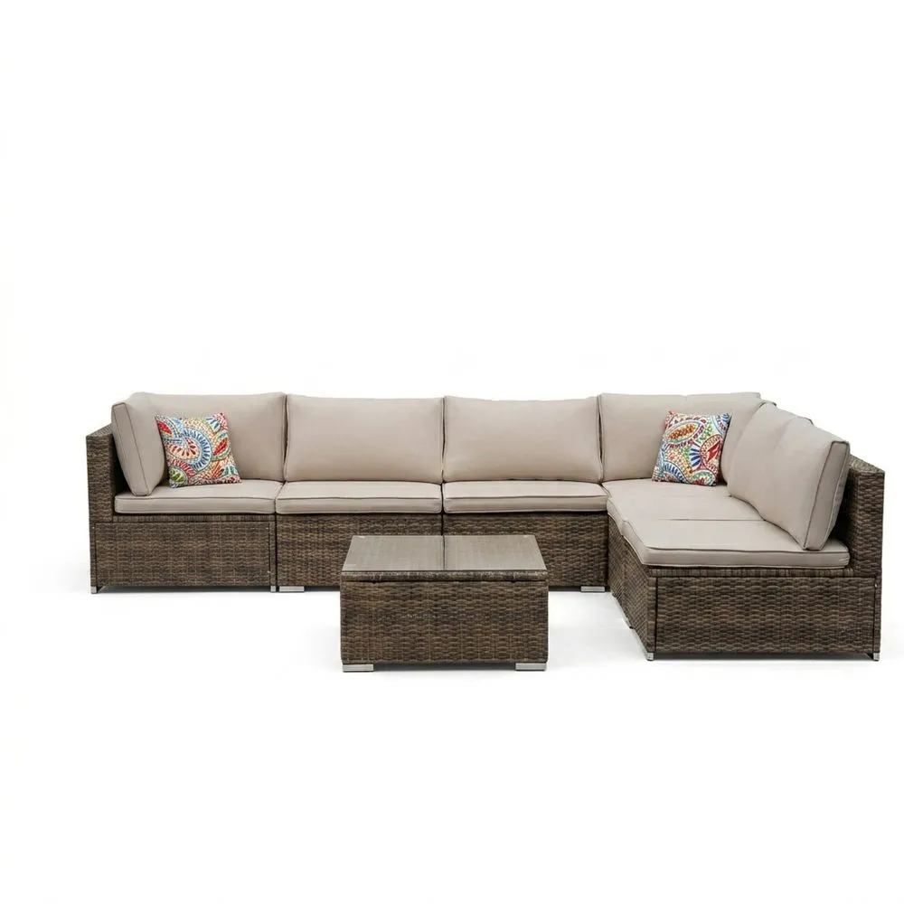 Divano modulare in rattan con tavolino