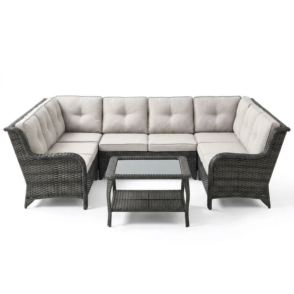 Set divano angolare in rattan sintetico grigio con cuscini in poliestere e tavolino in vetro temperato