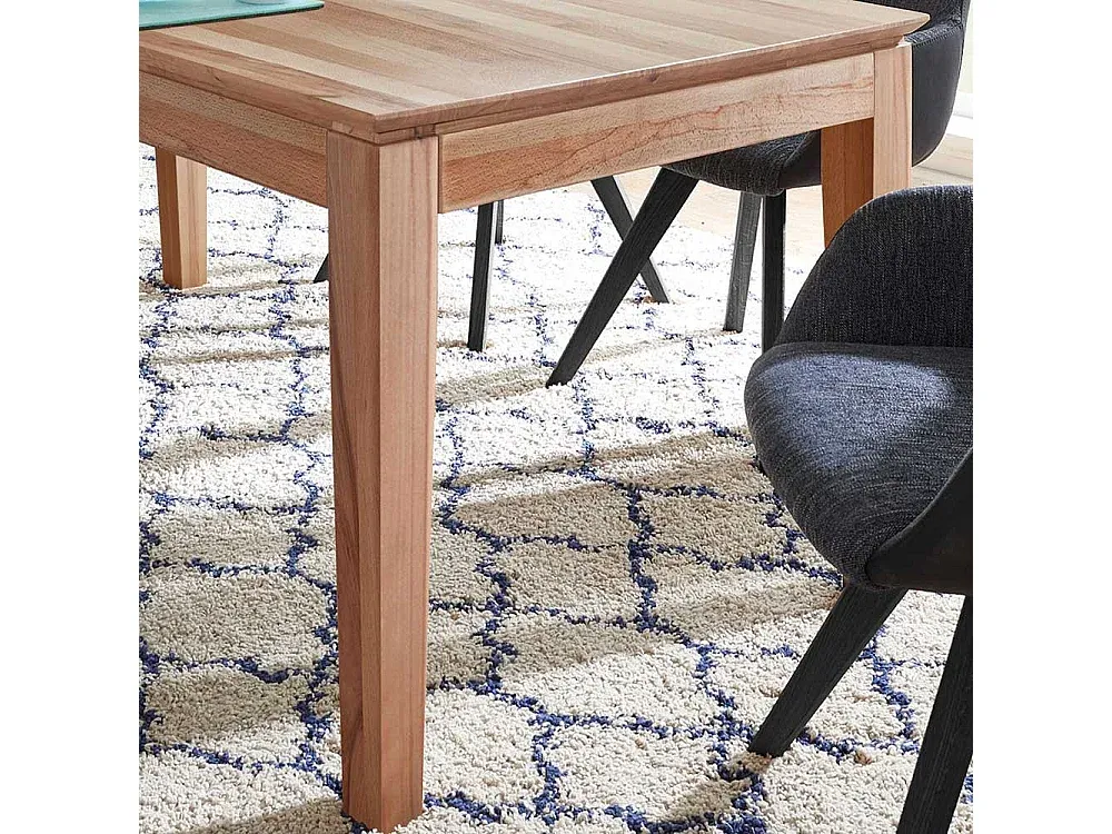 Moderner Esstisch aus Kernbuche mit Auszugsfunktion