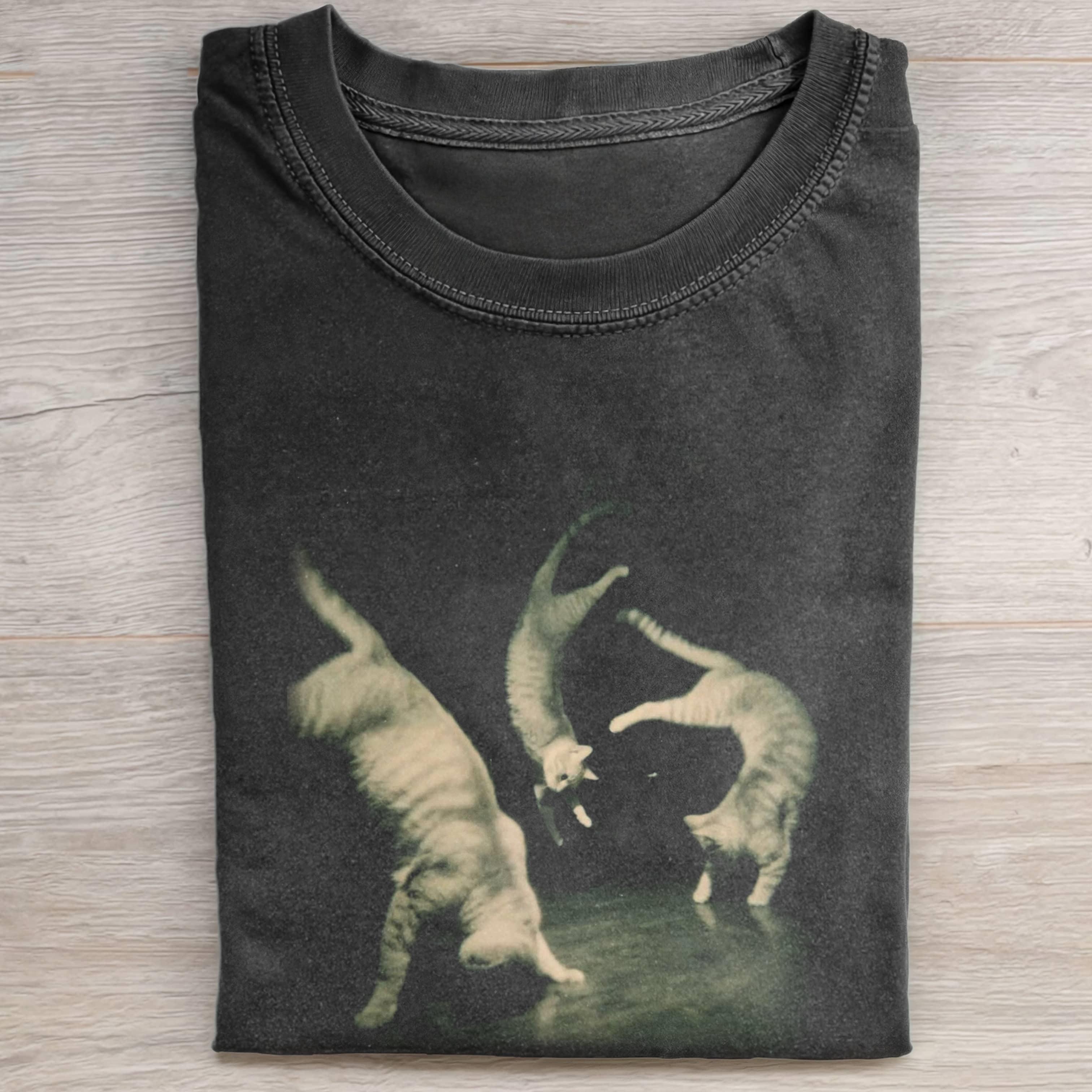 THREE CATS DANCING IN A RETRO STYLE T-SHIRT