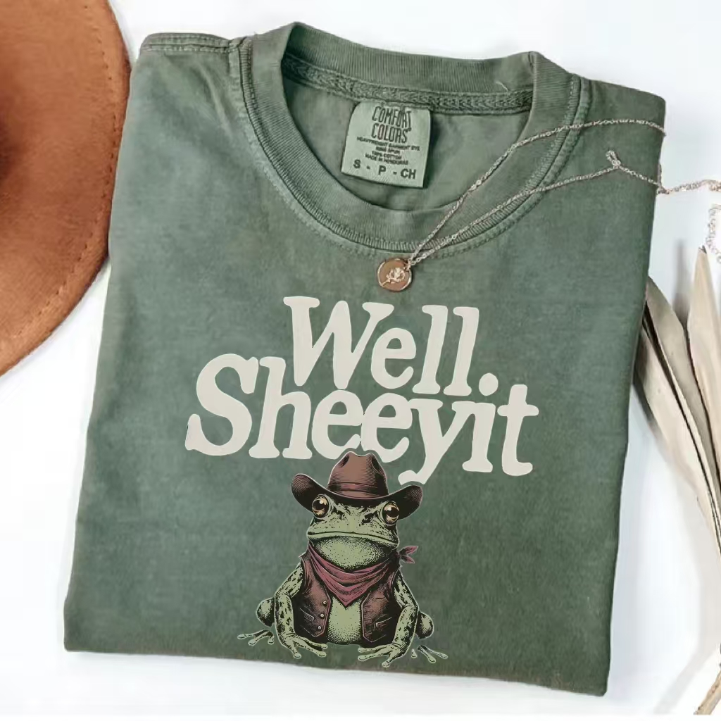 ShawnCraft® Official: Well Sheeyit Cowboy Frog Meme T-Shirt - Premium Breathable Cotton Apparel