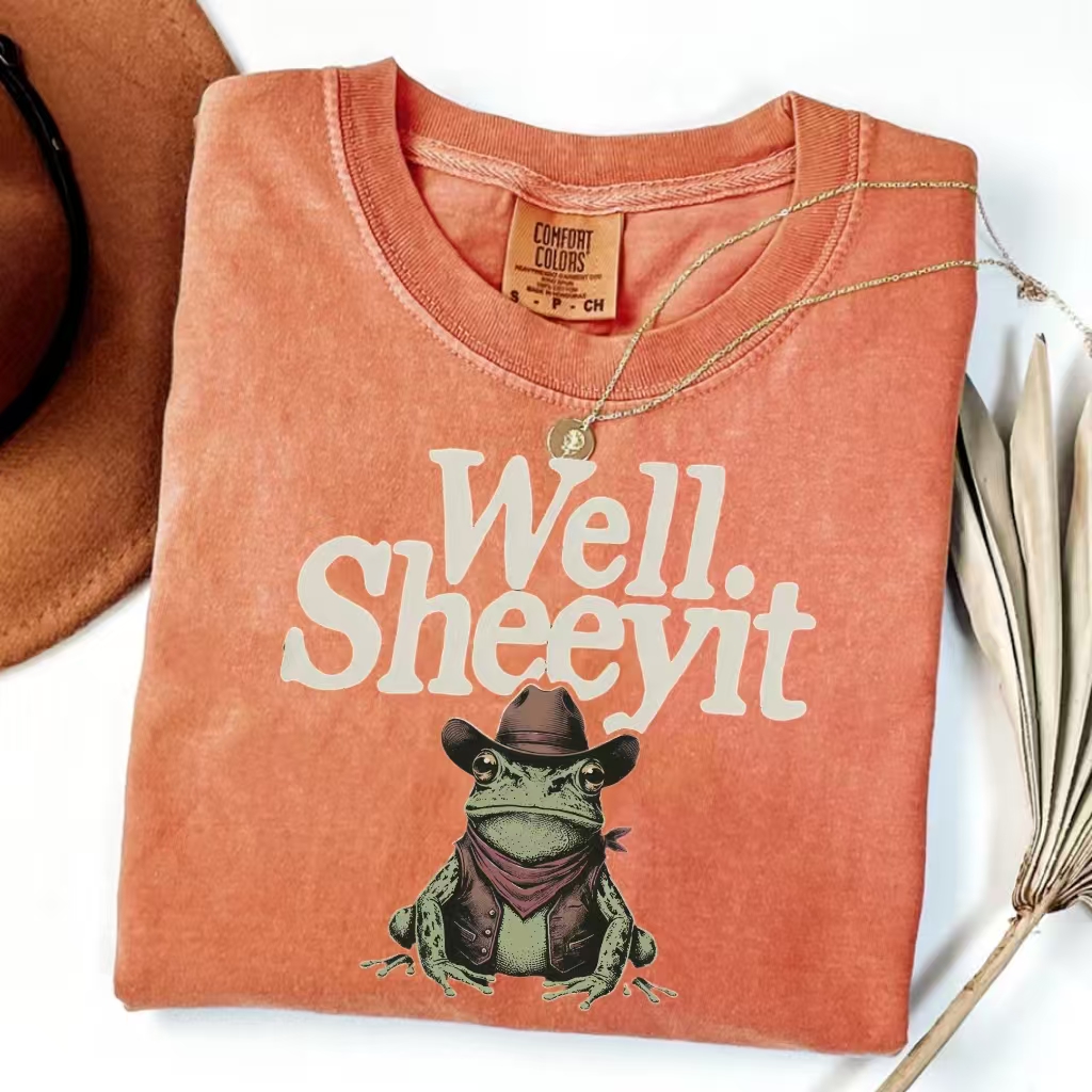 ShawnCraft® Official: Well Sheeyit Cowboy Frog Meme T-Shirt - Premium Breathable Cotton Apparel