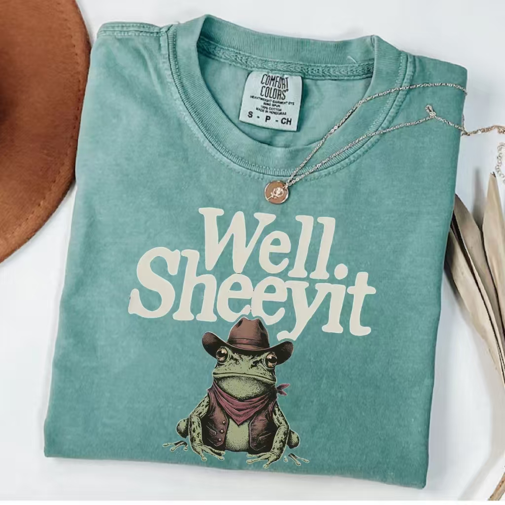 ShawnCraft® Official: Well Sheeyit Cowboy Frog Meme T-Shirt - Premium Breathable Cotton Apparel