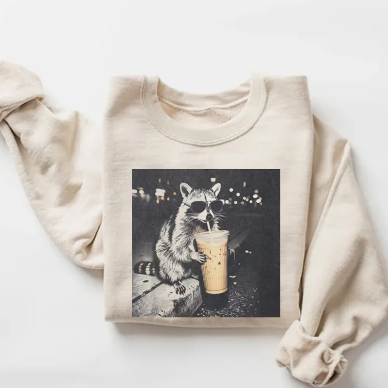 Funny Raccoon Drinking Iced Coffee Sweatshirt - Vintage Washed Apparel by VanceMade