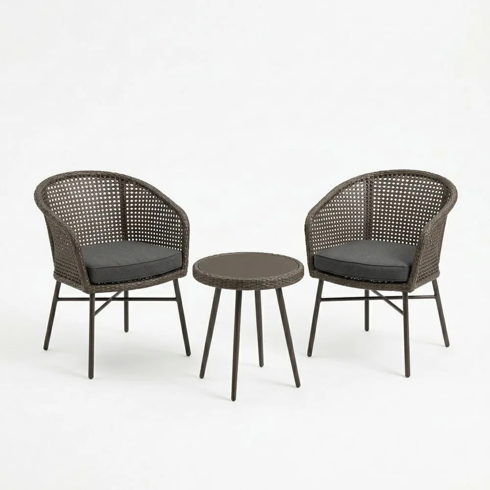 Set de muebles de resina trenzada con mesa de vidrio