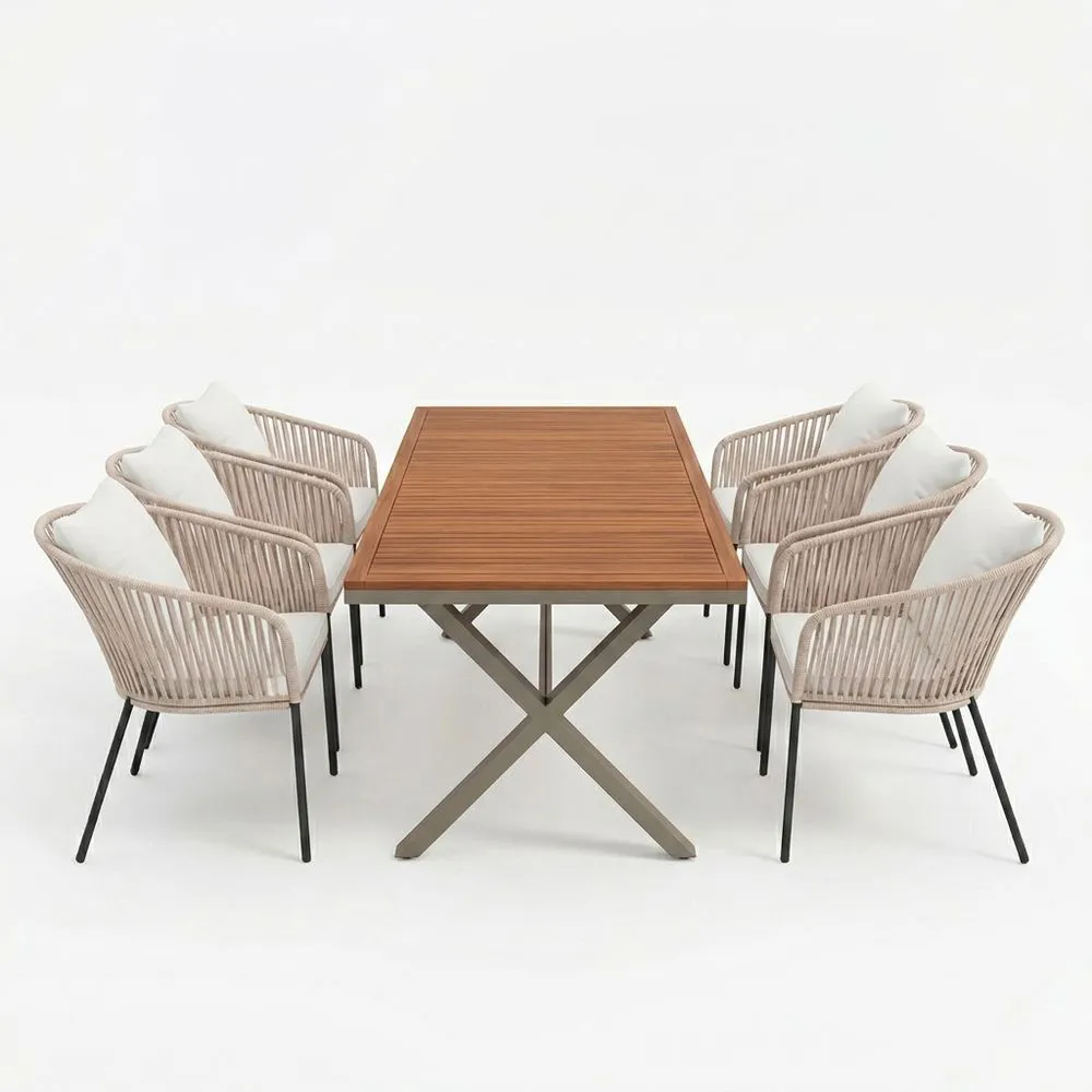 El conjunto de comedor para exteriores incluye una mesa de teca y 6 sillas de cuerda