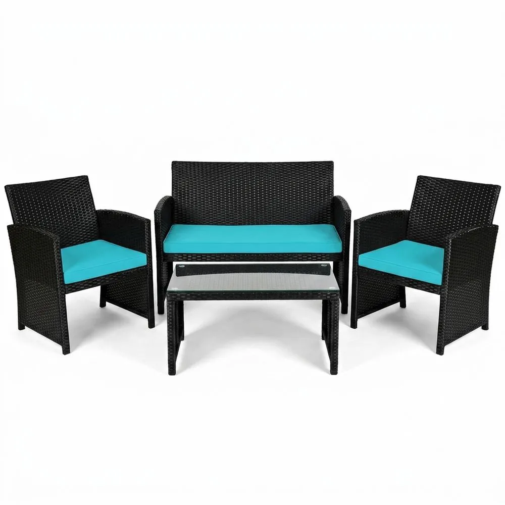 Conjunto de jardín de ratán negro con cojines azules y mesa de vidrio