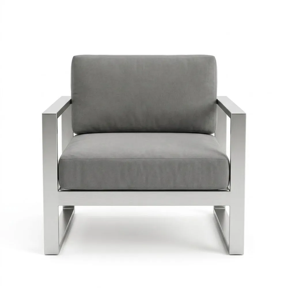 Sillón con estructura de acero inoxidable y cojín de fibra de poliéster gris