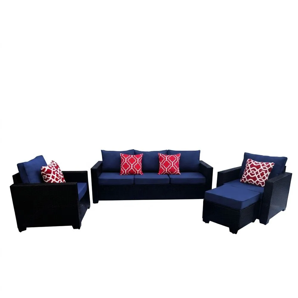 Conjunto de muebles de ratán sintético azul con cojines rojos.