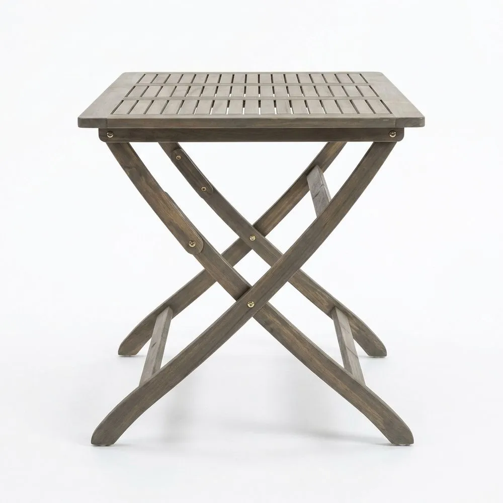 Una mesa plegable hecha de madera de acacia.