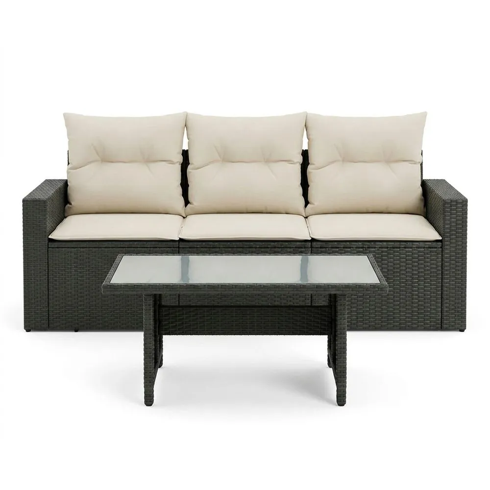 Conjunto de muebles de jardín de ratán sintético negro, con cojines beige y cristal templado.