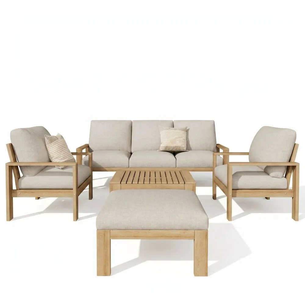 Conjunto de muebles de exterior de madera de acacia con cojines beige.