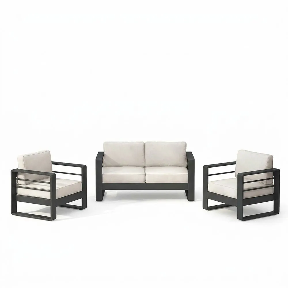 Conjunto de muebles de jardín de aluminio con cojines beige.