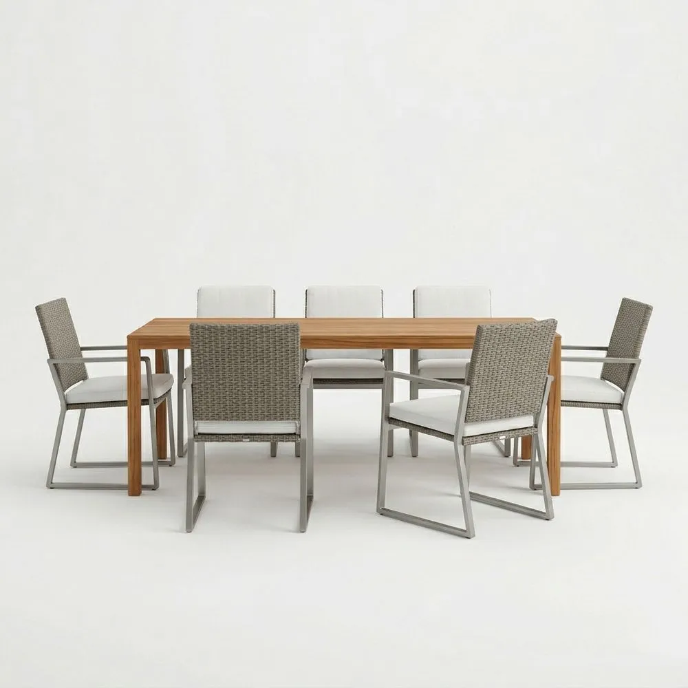 Mesa de comedor de madera sólida con sillas de ratán sintético y acero inoxidable