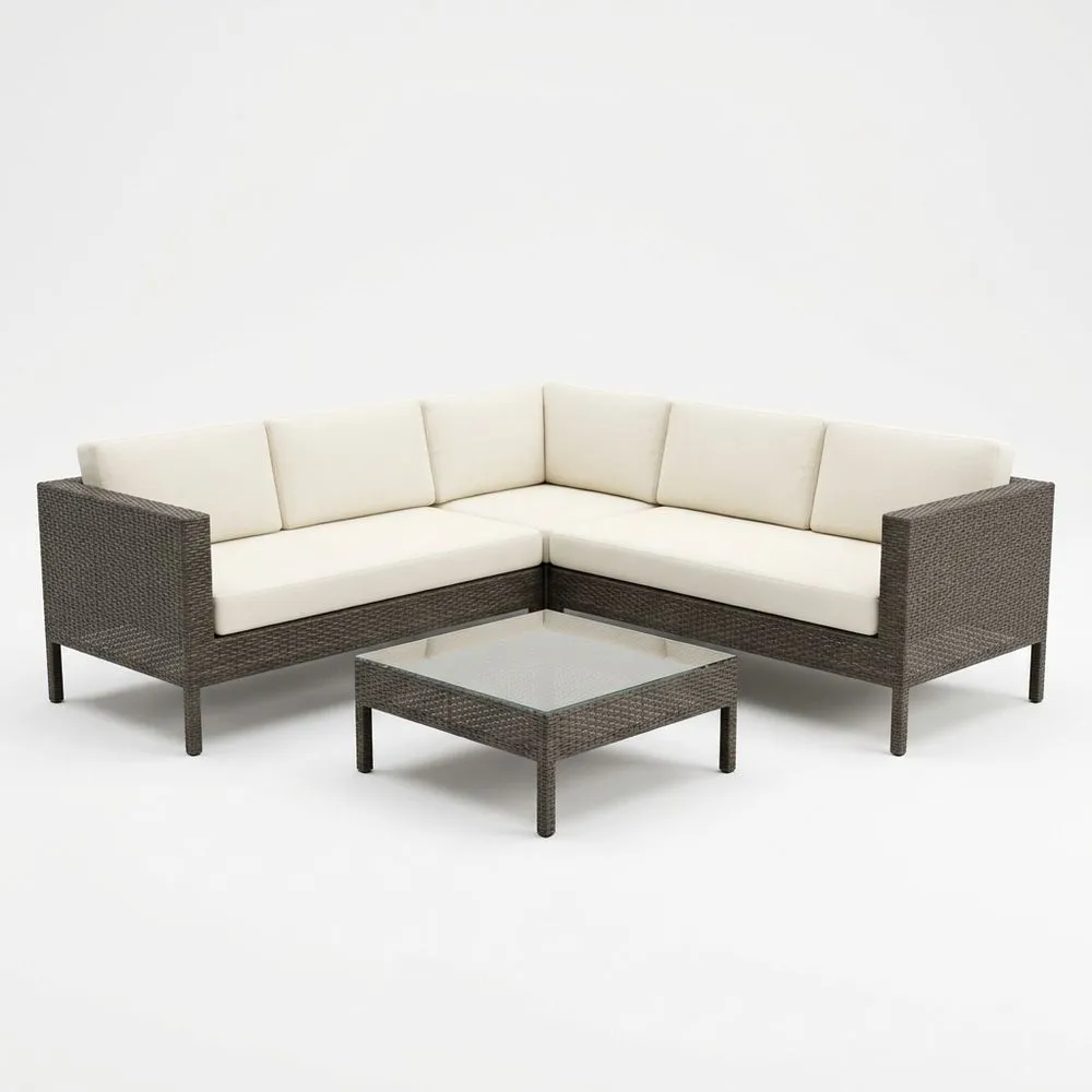 Set de muebles de jardín en esquina de ratán sintético con cojines crema y mesa de vidrio templado