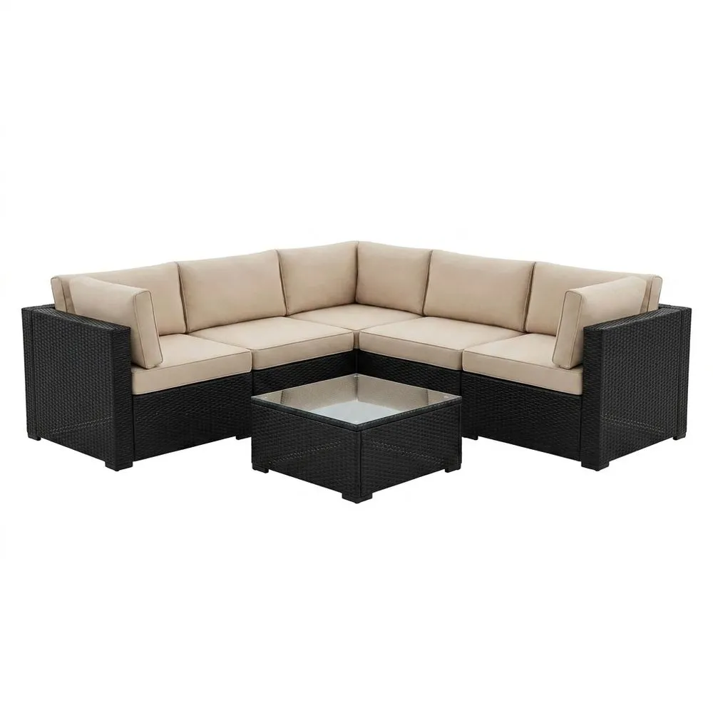 Conjunto de sofás esquineros de ratán de polietileno negro con cojines beige y mesa de centro
