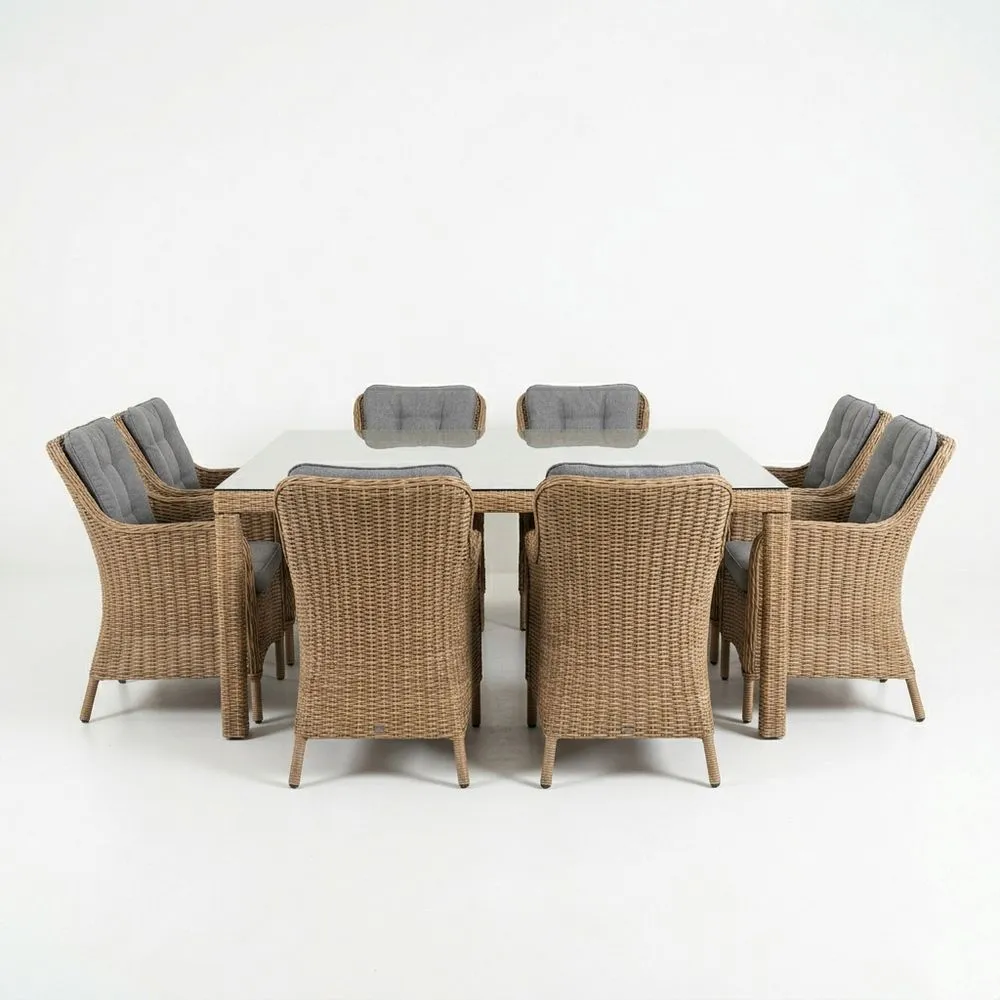 Conjunto de comedor exterior con mesa de vidrio templado y 8 sillas de mimbre sintético con cojines grises