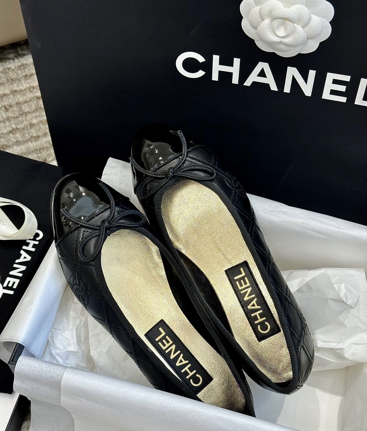Classic Black Quilted Lambskin Ballet Flats with Patent Toe