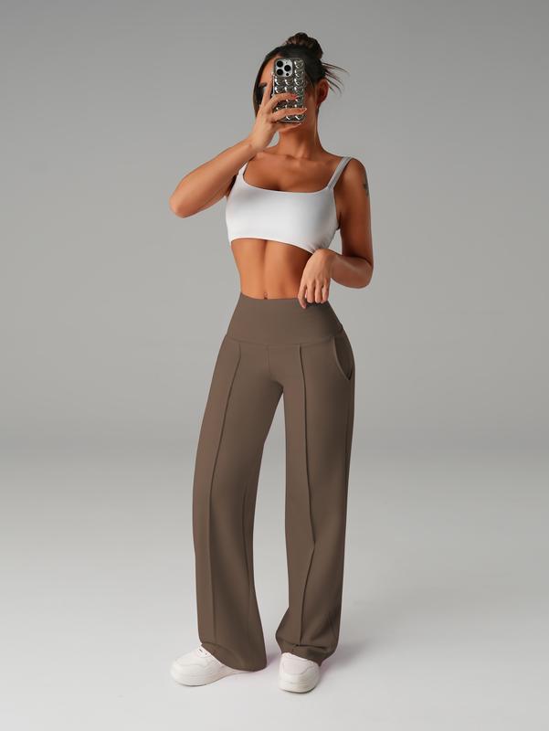 Pantalones de mujer de tiro medio, cintura elástica y pernera ancha; estilo deportivo casual, cómodos bolsillos laterales; prenda versátil para primavera y otoño; ideales para el día a día; moda femenina.