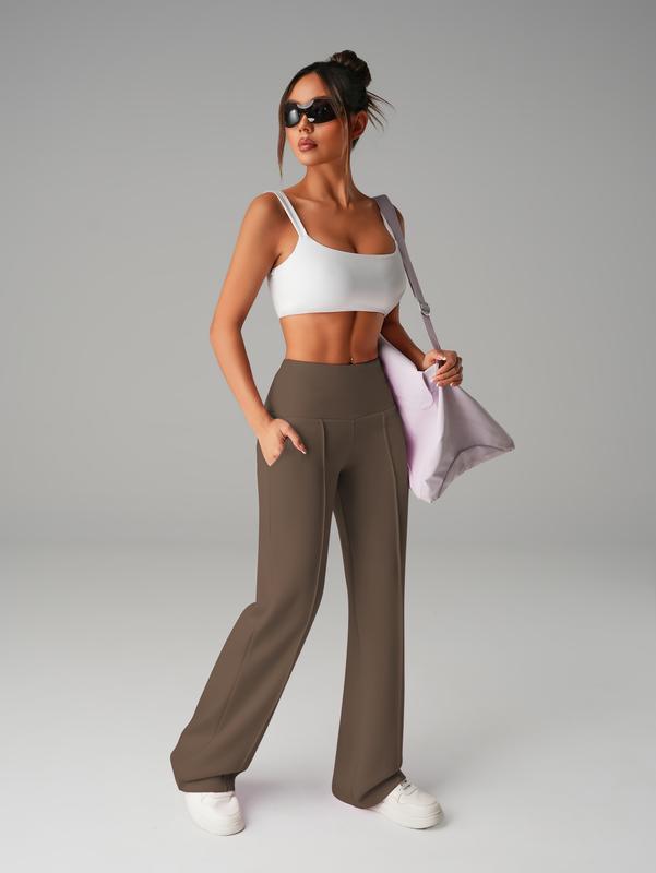 Pantalones de mujer de tiro medio, cintura elástica y pernera ancha; estilo deportivo casual, cómodos bolsillos laterales; prenda versátil para primavera y otoño; ideales para el día a día; moda femenina.