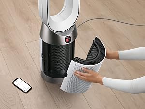 Person removing the purifier shrouds to change the filter.