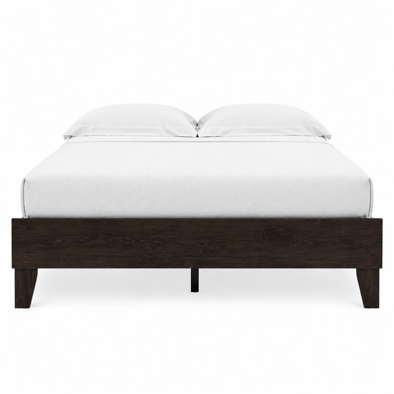 Lit en bois avec matelas et oreillers