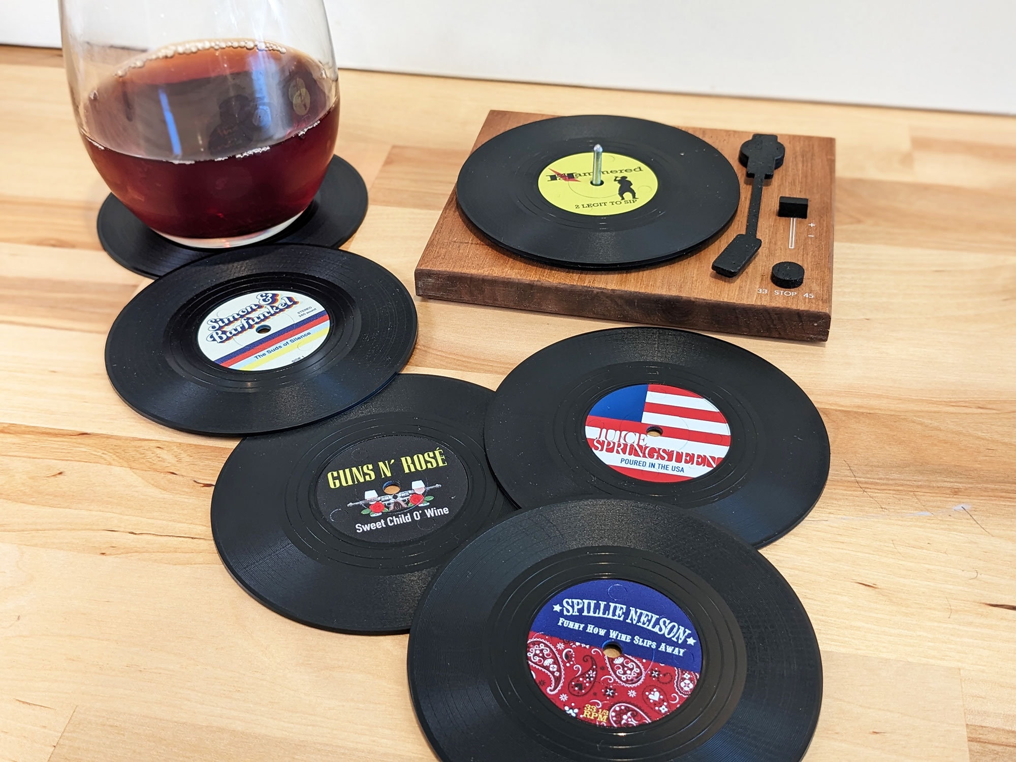 Retro vinyl record coaster set with turntable-style holder