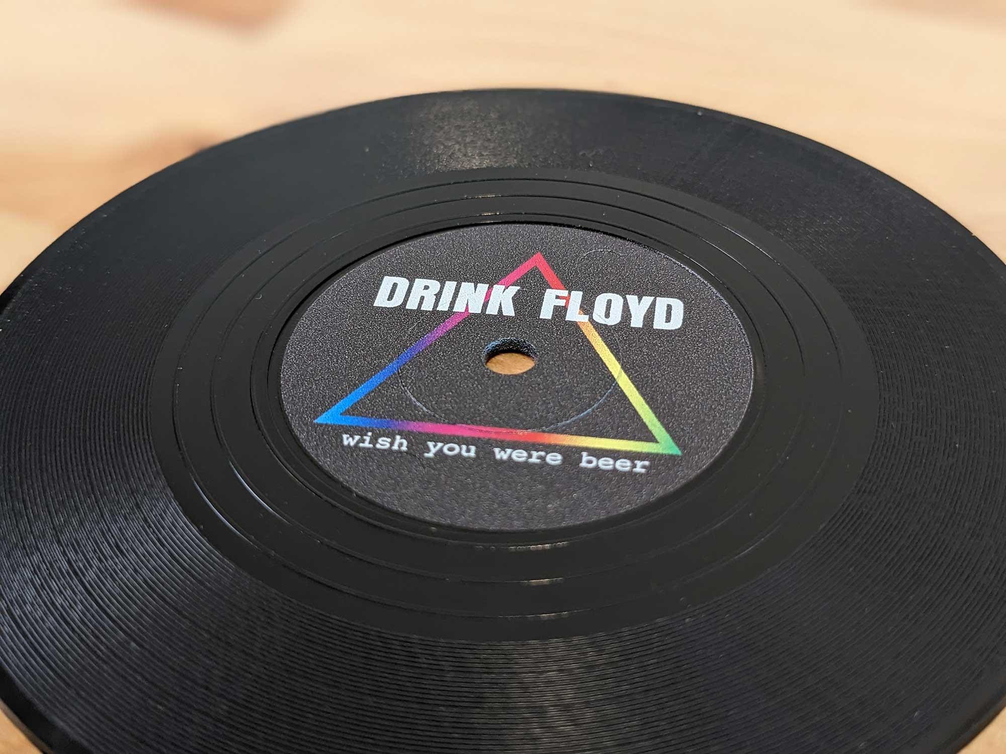 Close-up of grooved vinyl record coaster