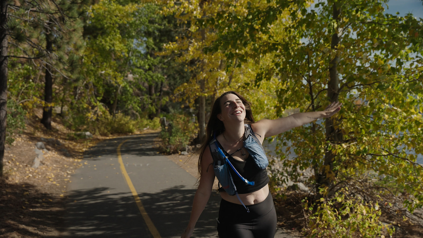 Runner on a lakeside trail