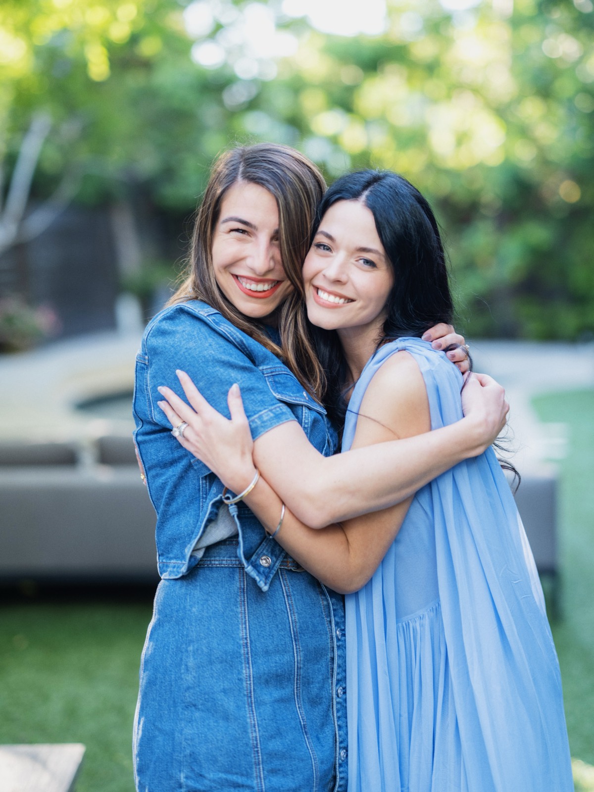 Two women embracing outdoors