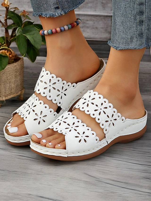 Women's White Slip-On Sandals with Floral Cut-Out Design Comfortable Sole and Casual Style for Summer Wear and Daily Outings