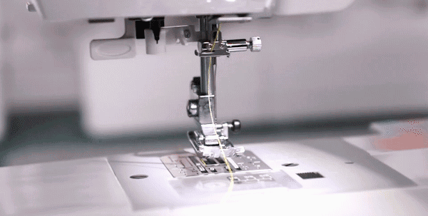BUILT-IN NEEDLE THREADER