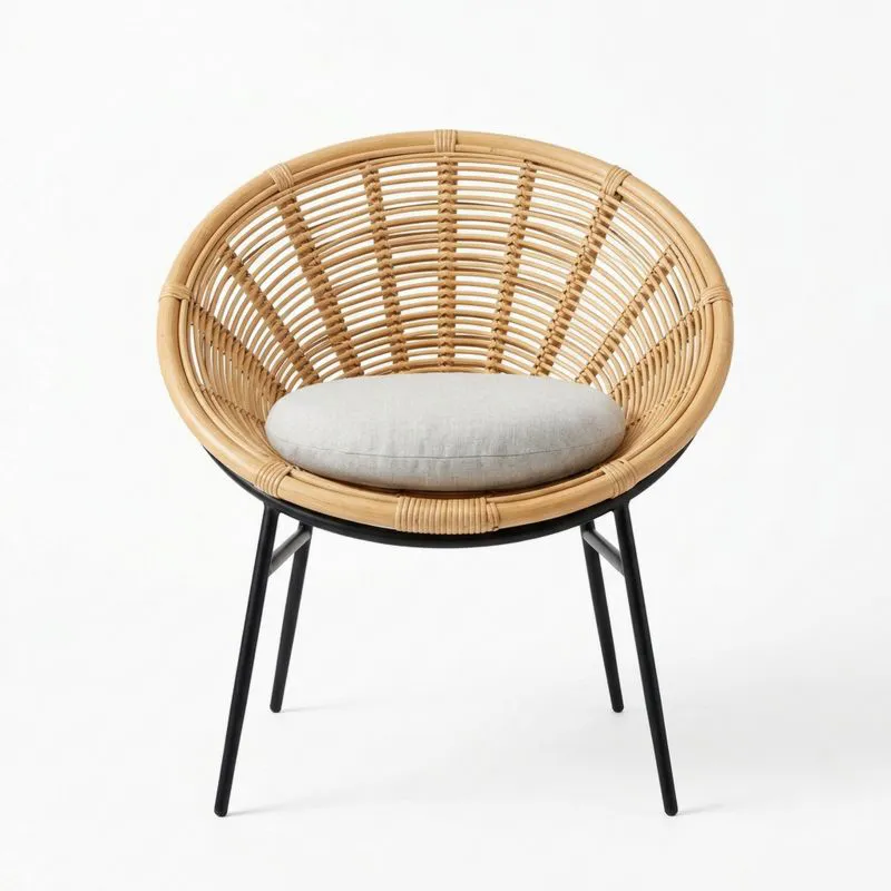 Silla de ratán con cojín de algodón y patas metálicas negras-seltrivaria
