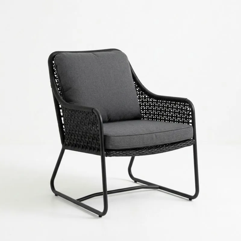 Sillón de ratán sintético negro con cojines de poliéster gris-seltrivaria