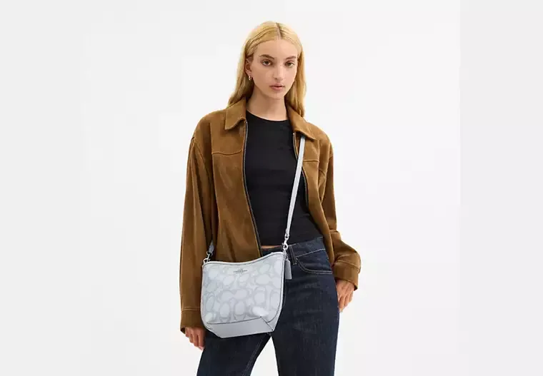 City Bucket Bag In Sketch Signature Canvas
