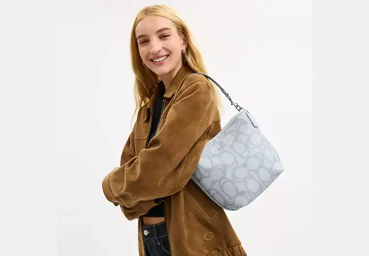 City Bucket Bag In Sketch Signature Canvas