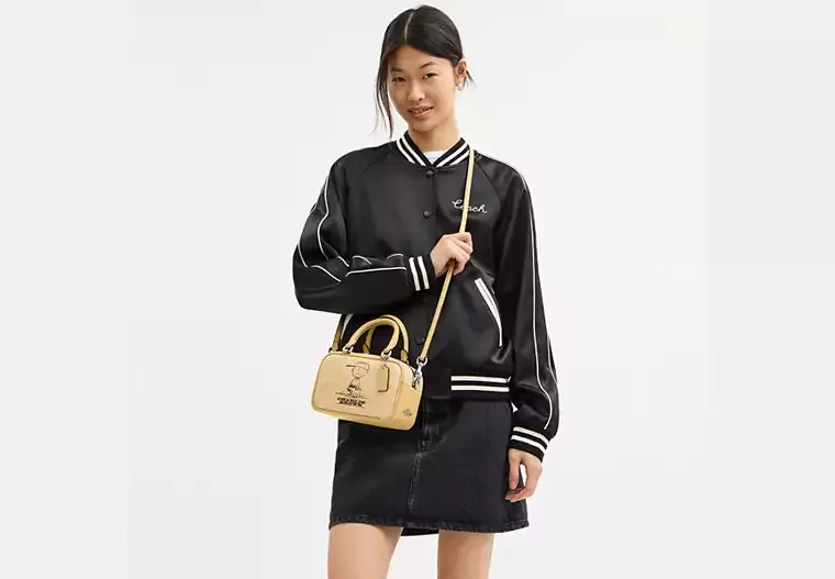 Coach X Peanuts Satchel Crossbody Bag In Signature Canvas With Charlie Brown
