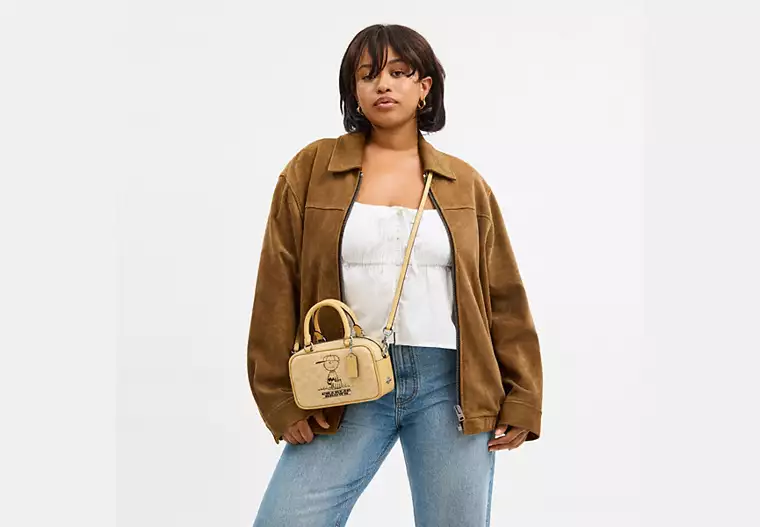 Coach X Peanuts Satchel Crossbody Bag In Signature Canvas With Charlie Brown