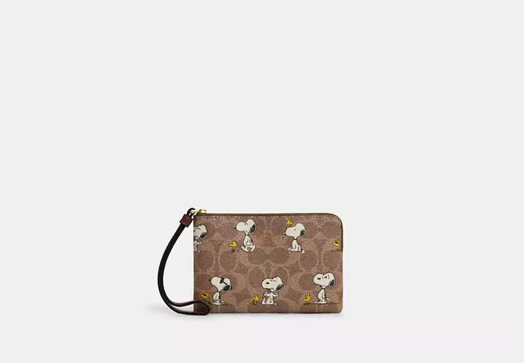 Coach X Peanuts Corner Zip Wristlet In Signature Canvas With Snoopy Print